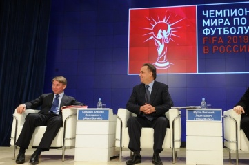 Alexey Sorokin (left) under the newly unveiled 2018 FIFA World Cup Official Emblem