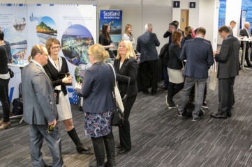 Exhibitors and delegates networking at Host City 2016