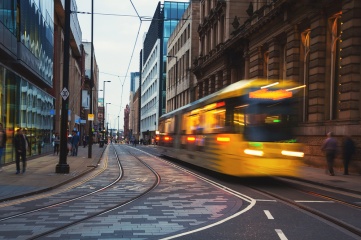 Light rail Metrolink tram in the city center of Manchester