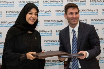 Reem Al Hashimy, Director General of Expo 2020, with soccer superstar Lionel Messi (Image Credit: Supplied / Dubai Media Office)