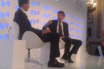 Lord Coe (right) speaking at Securing Sport in October 2014 