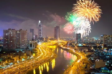 Crowds line the streets to watch fireworks usher in 2014 in Ho Chi Min City, Vietnam